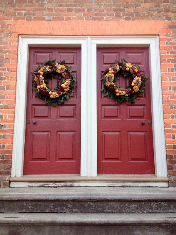Fall Wreaths on Red Door during Holiday Season 