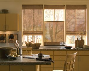 Hunter Douglas Provenance® Wood Shades in a kitchen with an island